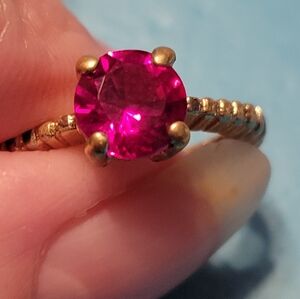 Elegant Gold Ring with Pink Gemstone
